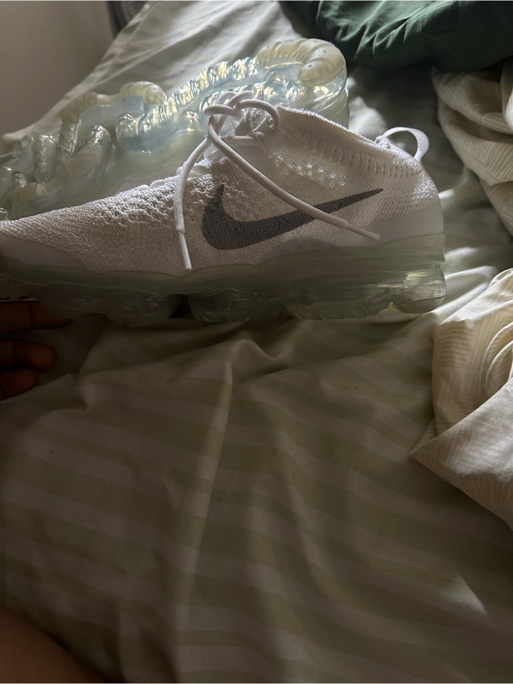 Nike Women’s White Flyknit Sneaker with Gray Swoosh